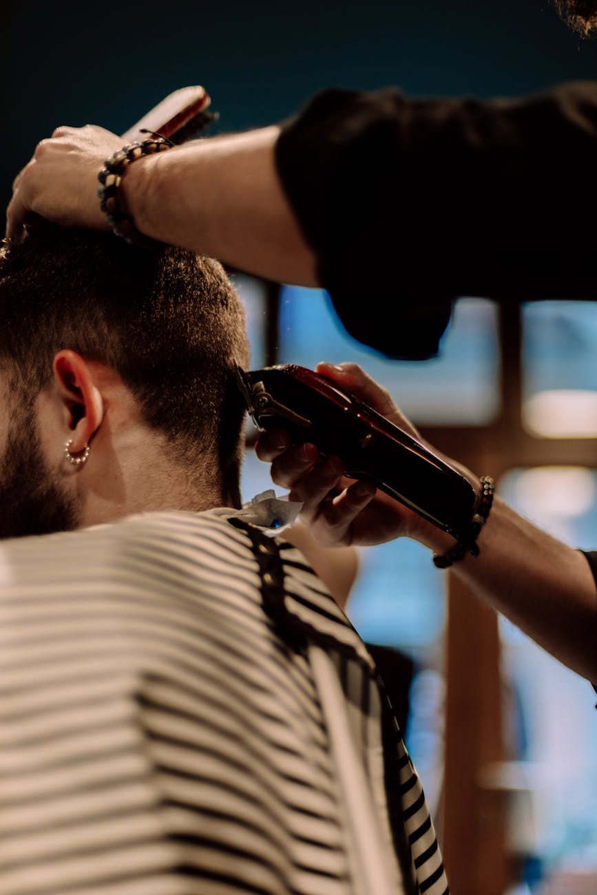 a man having a haircut