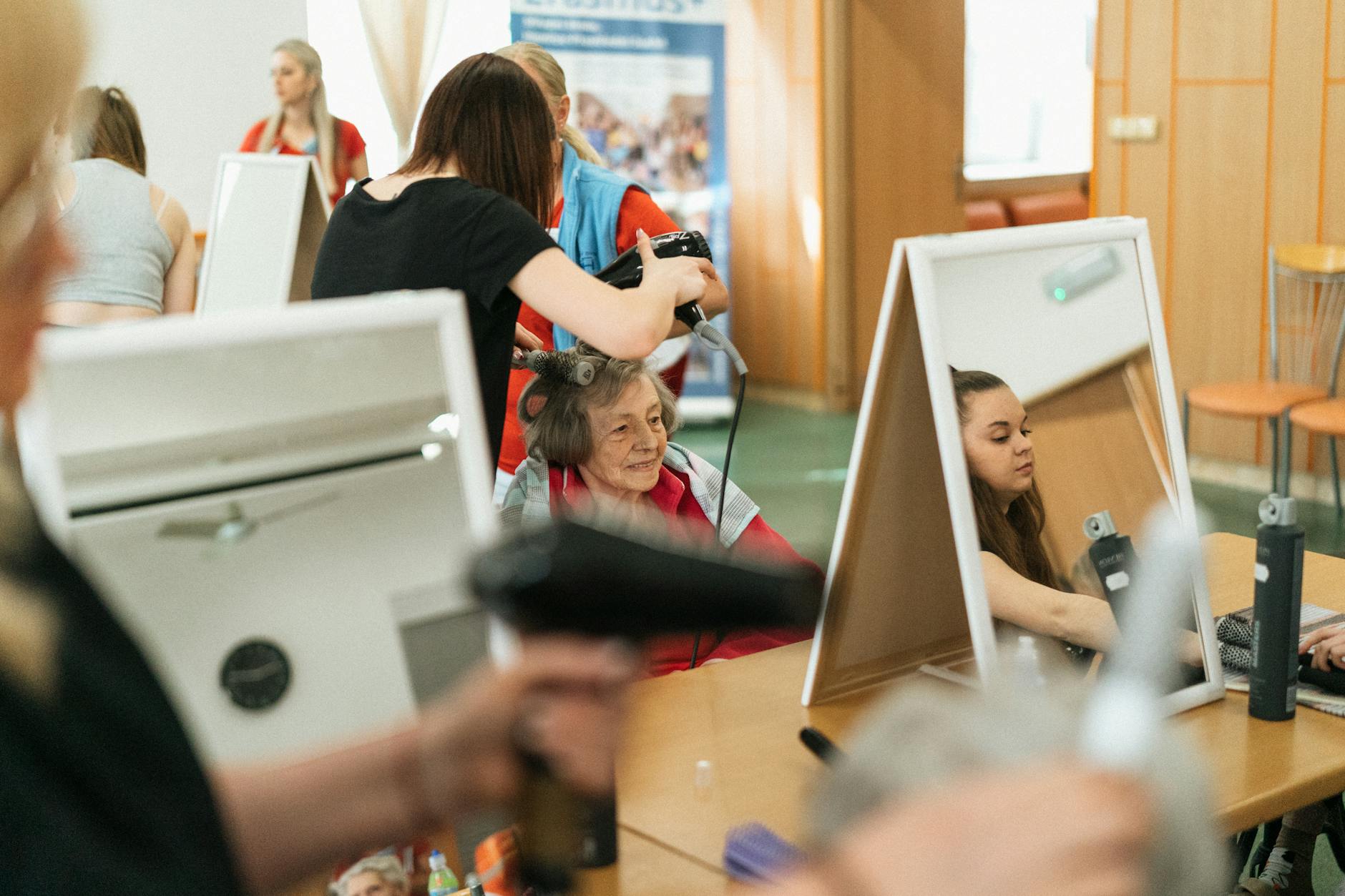 Mane Republic: The New Standard of Style Sovereignty at Just For Hair 1 senior woman in hair salon