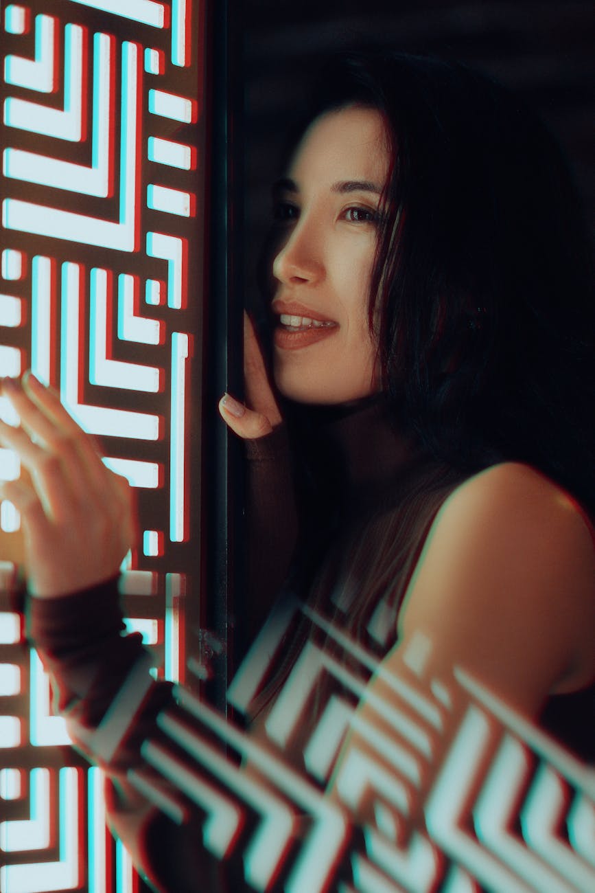 smiling brunette by window