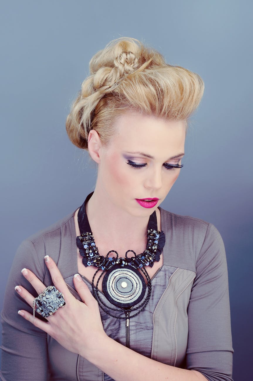 Major: A Transformation of Command at Just For Hair 1 woman with hand on chest
