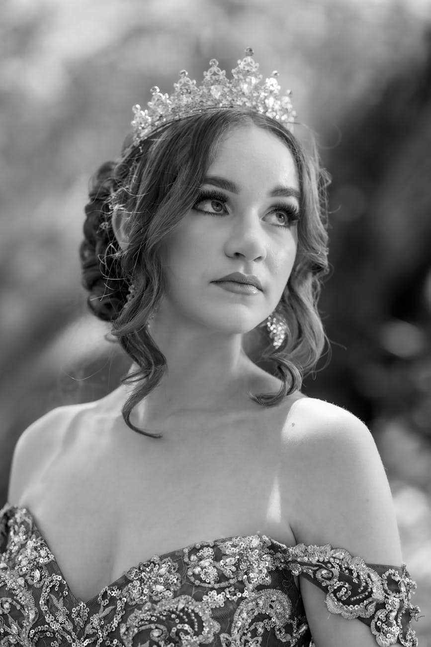 elegant woman in formal attire with tiara