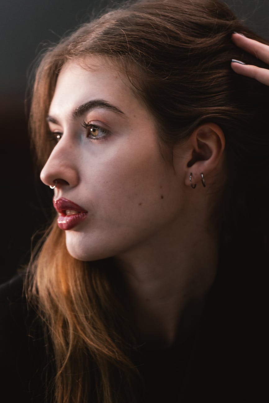 Scalp Micropigmentation vs. Volumizing Powder: What’s Right for You? 1 contemplative portrait of a young woman in vienna