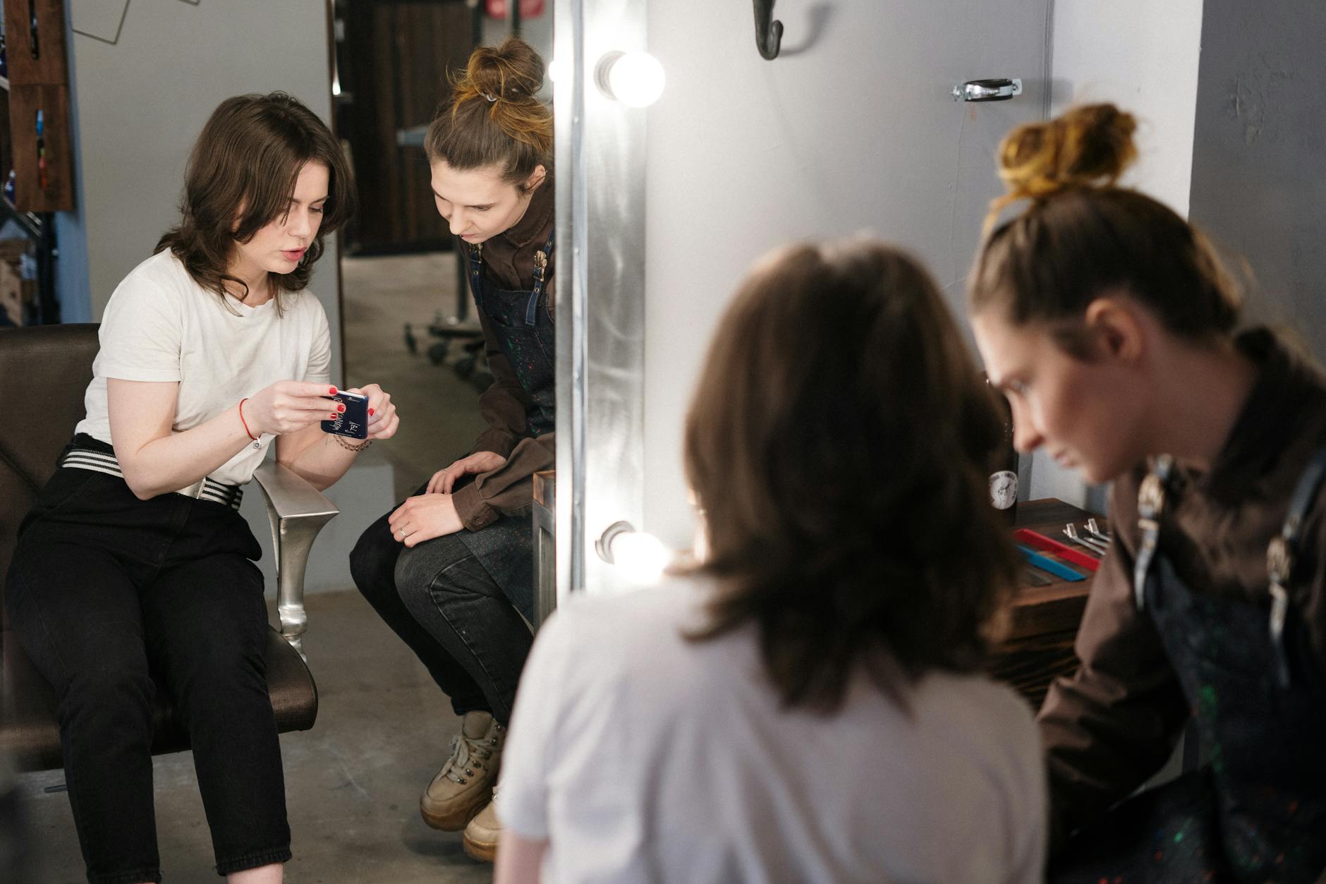 Your Color Consultation Checklist: How to Prep at Just For Hair 1 woman getting a haircut