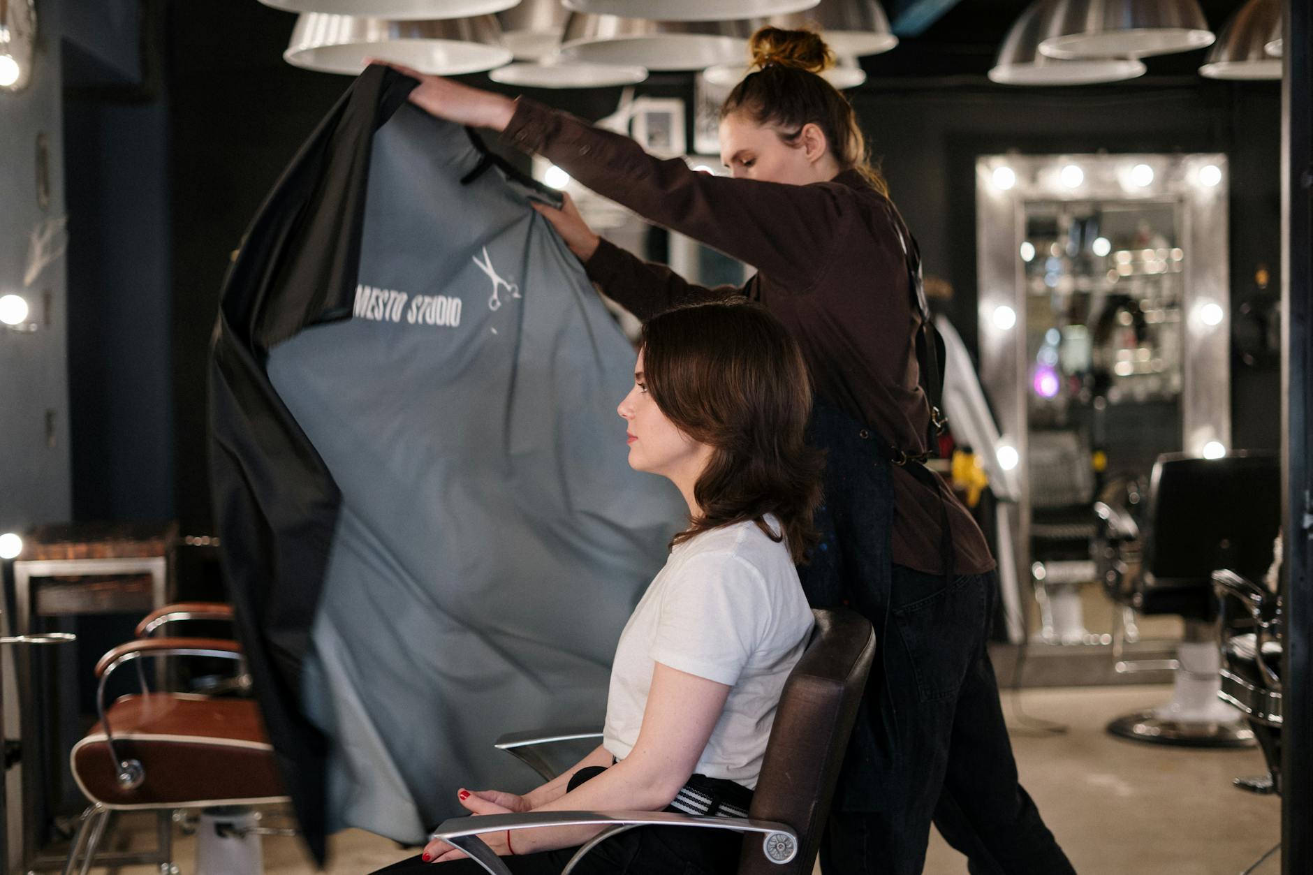The "Silent Appointment": Mental Health First at Just For Hair 1 woman getting a haircut