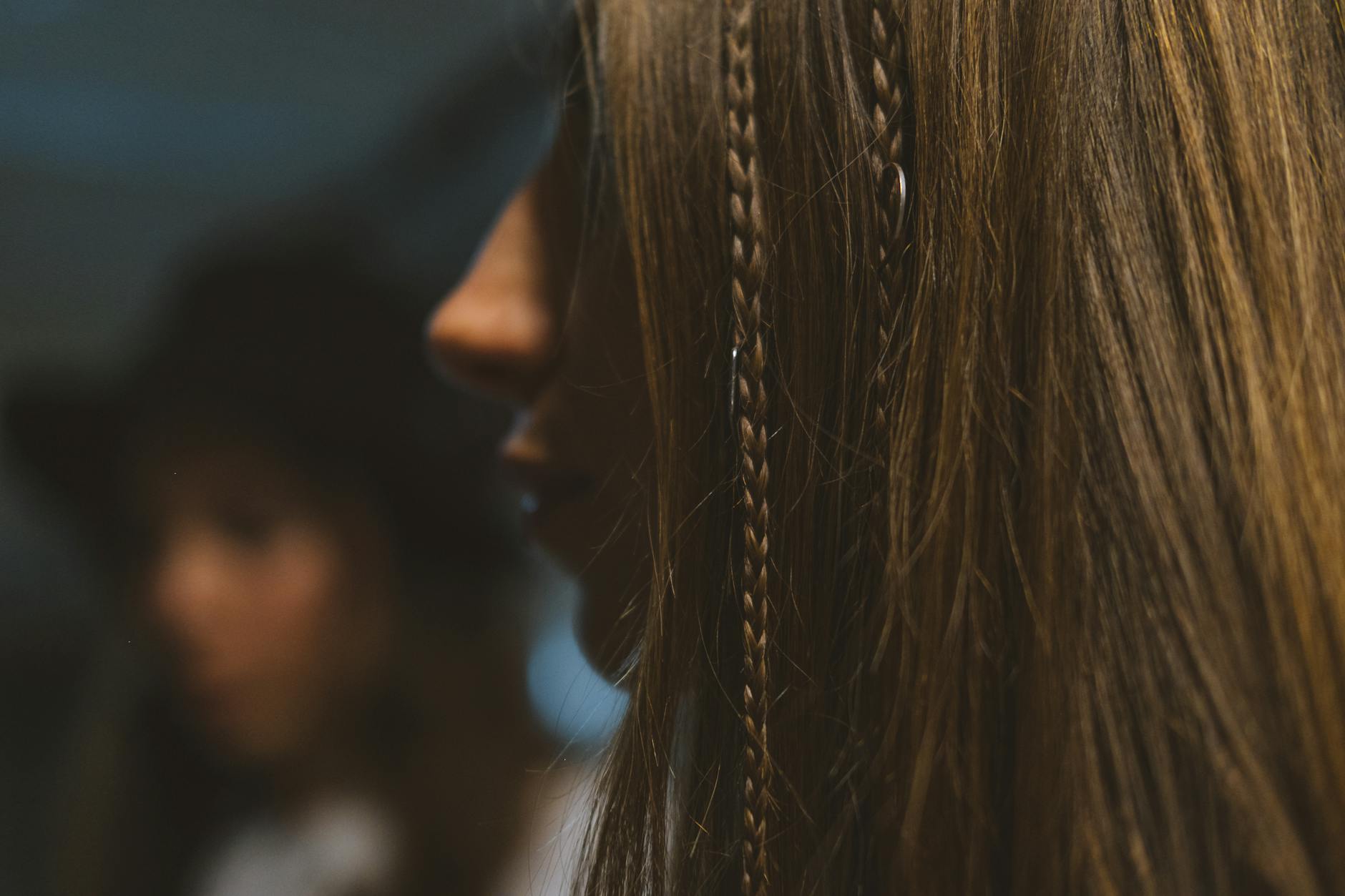 Spectral Strands: The 2026 Art of Multi-Dimensional Light 1 close up shot of a woman s braided hair