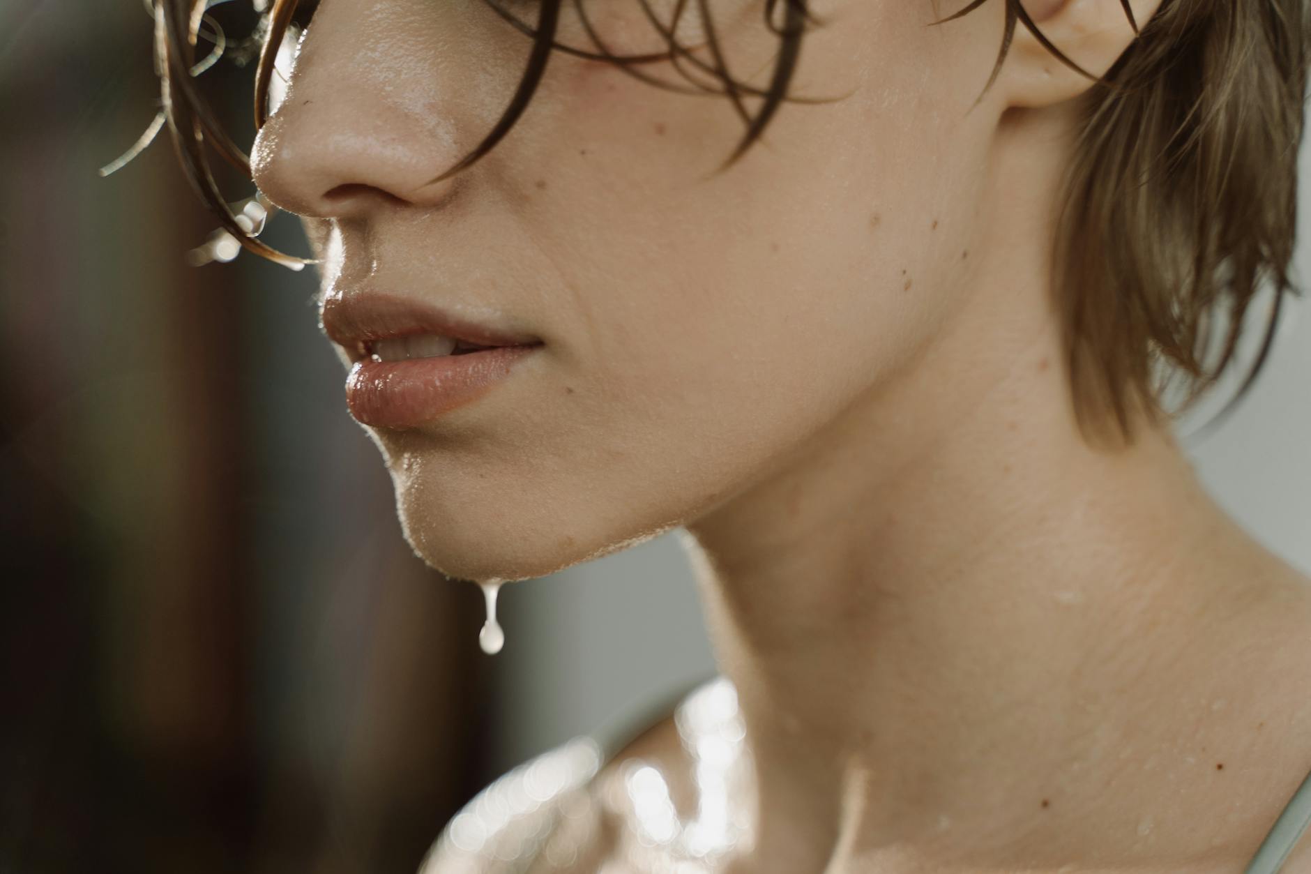 From Gym to Office: Sweat-Proof Styles at Just For Hair 1 sweaty woman in close up photography
