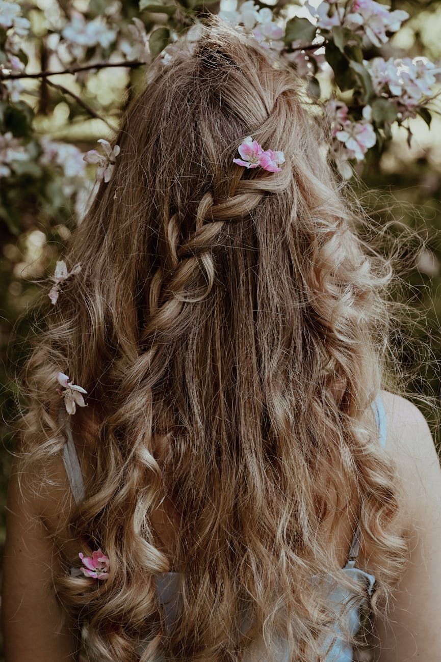 braided hair decorated with flowers