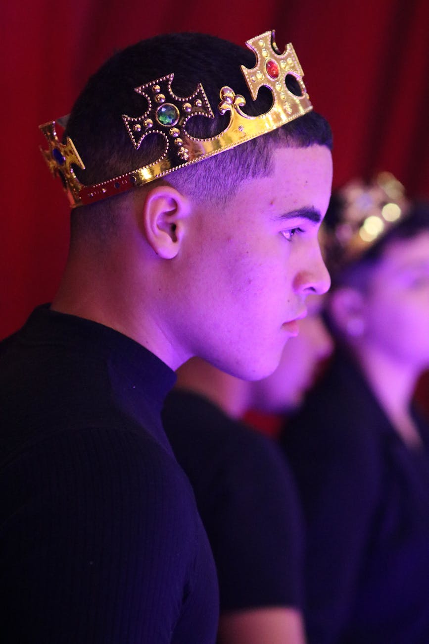 Jewel – Gem-Toned Colors: Radiant Luxury at Just For Hair 1 man with a crown on his head