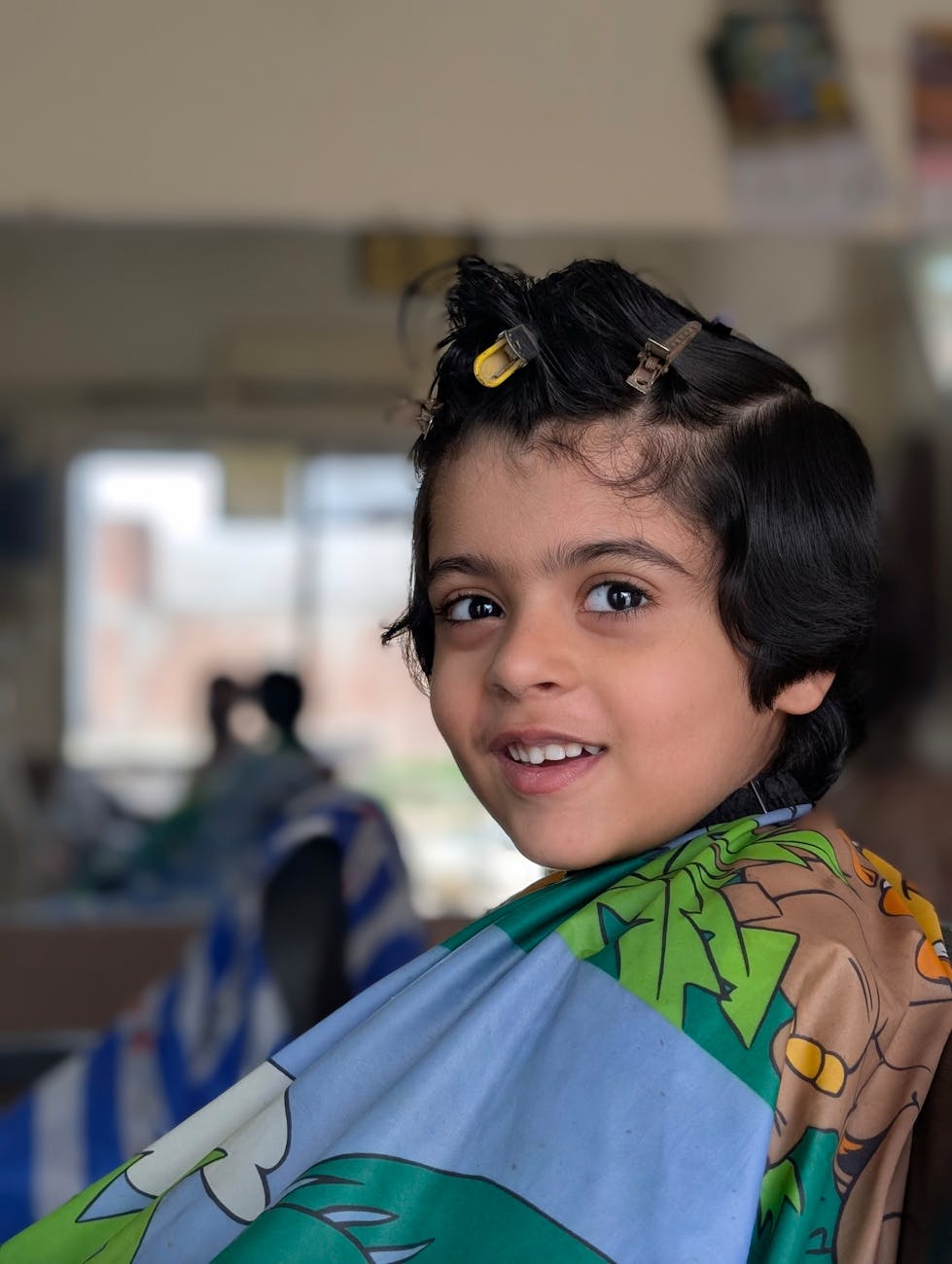 child s haircut at a salon in pakistan