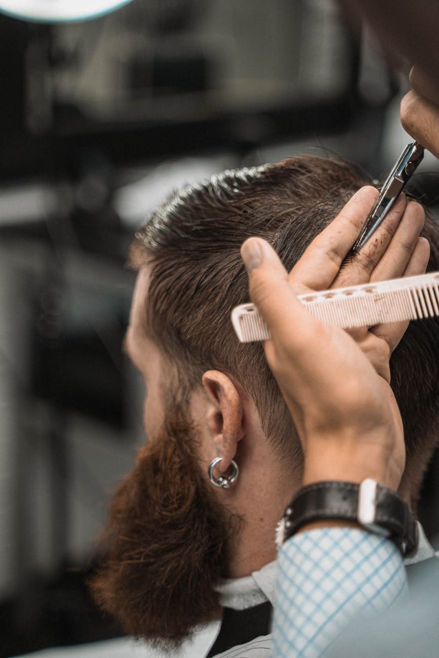 a man having a haircut