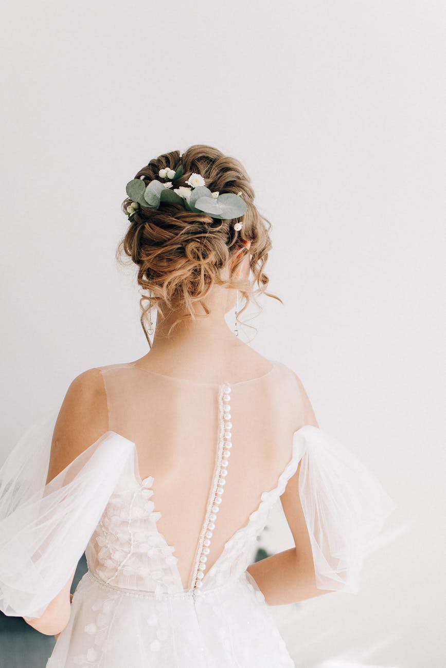 back view of a woman in her white dress