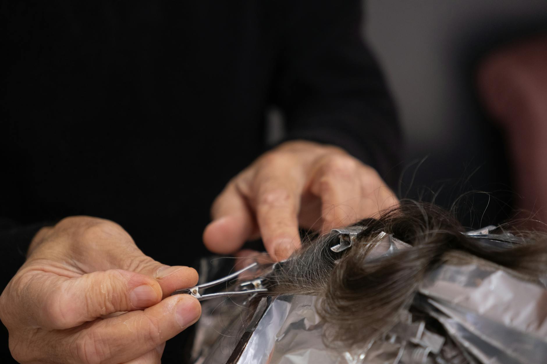 close up of hair coloring process in salon