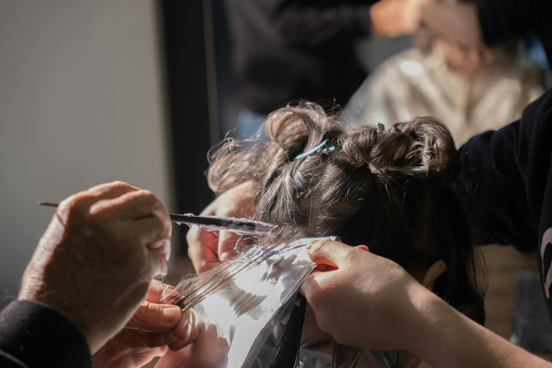 professional hair coloring in salon setting
