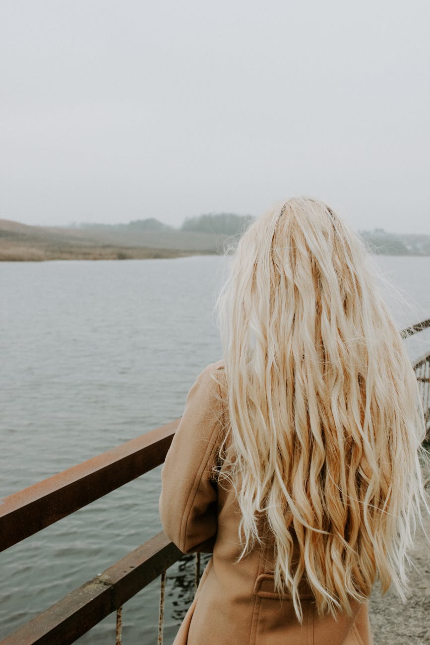 woman standing near railing