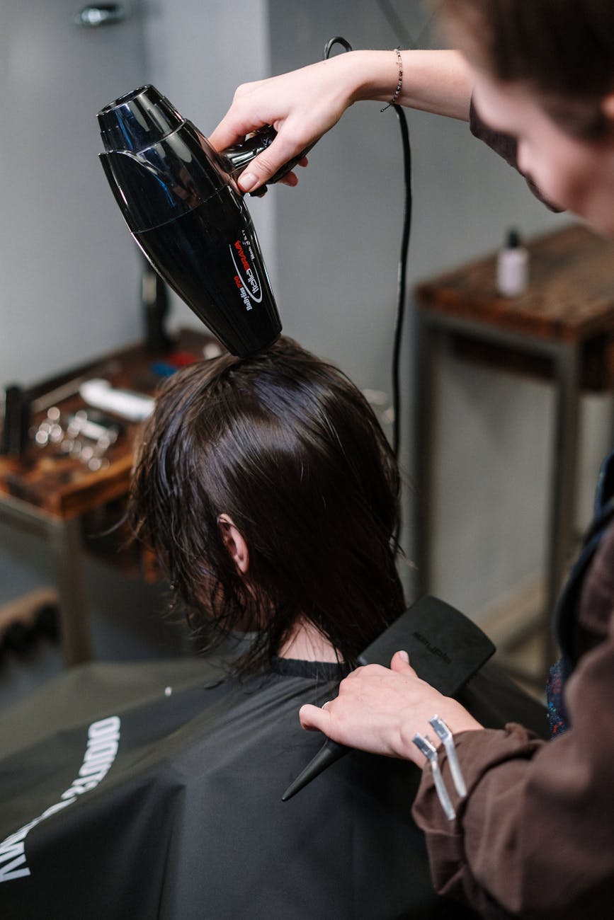 woman getting her hair dry