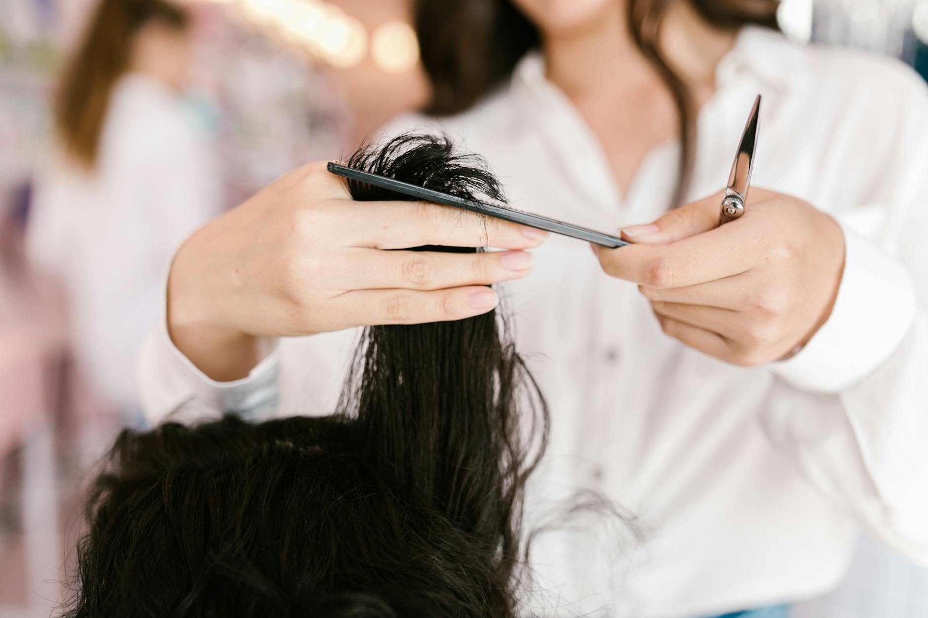 a person getting a haircut