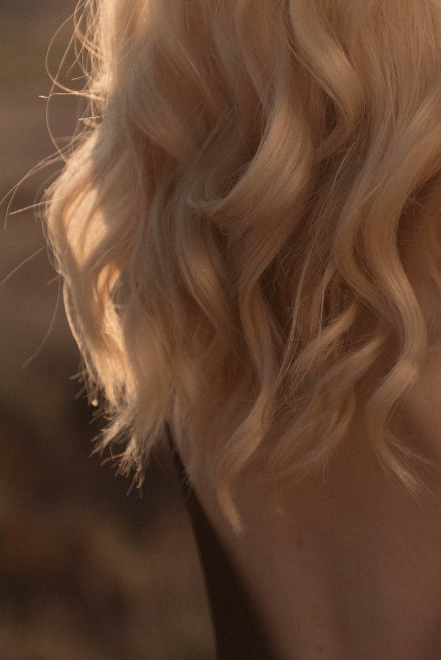 wavy blonde hair with sunlit