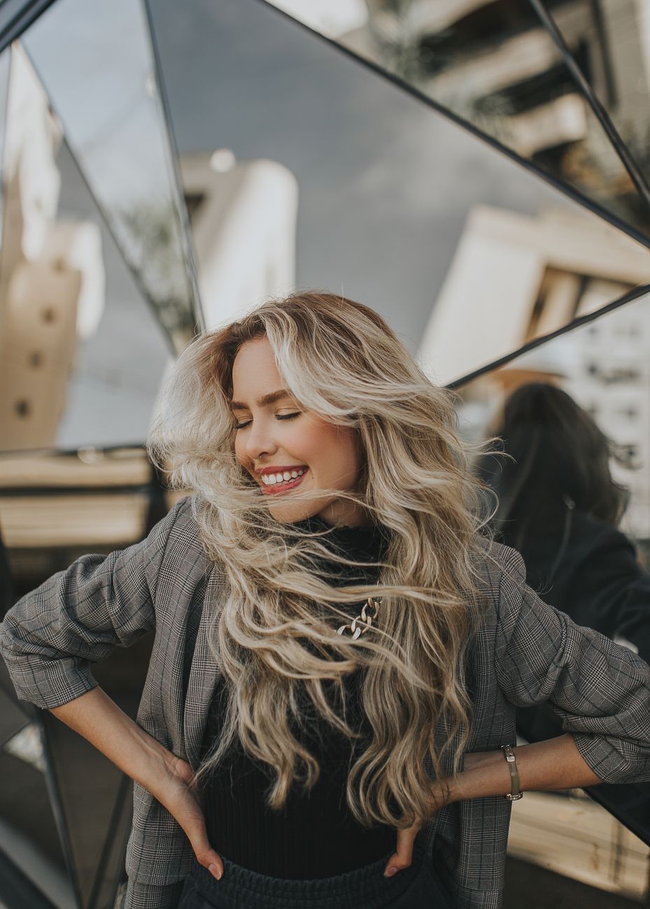blonde in checked jacket