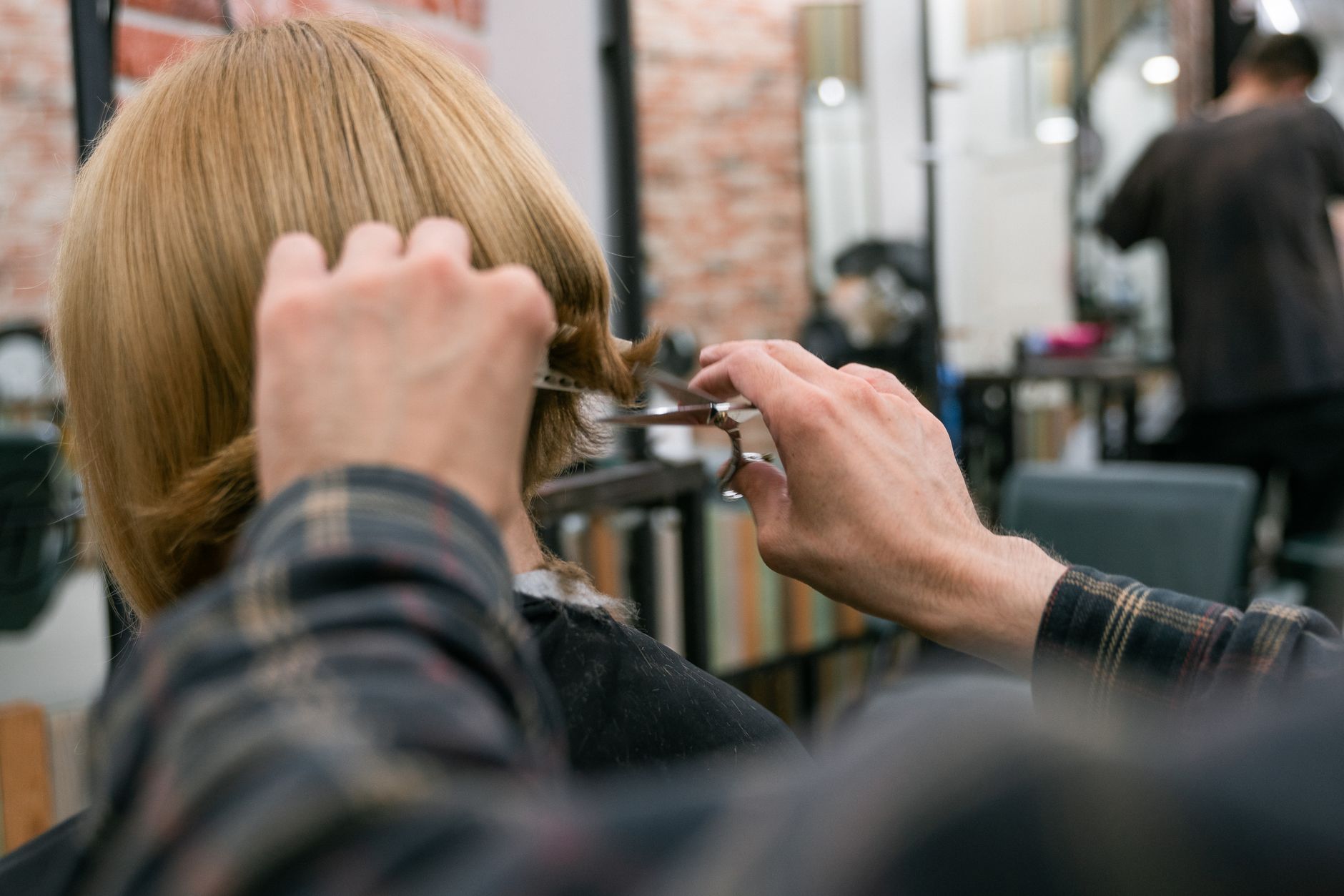 The Anatomy of a Precision Haircut at OP Hair Salon 1 back view of a woman at hairdresser