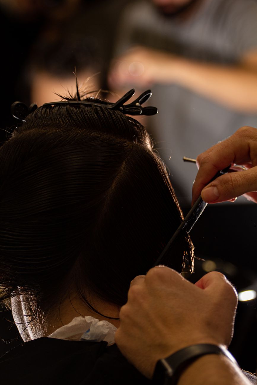 close up of cutting hair