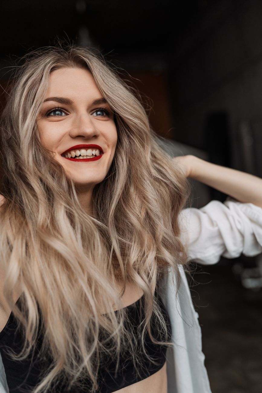 a woman wearing red lipstick