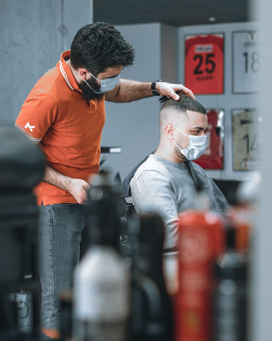 a man having a haircut