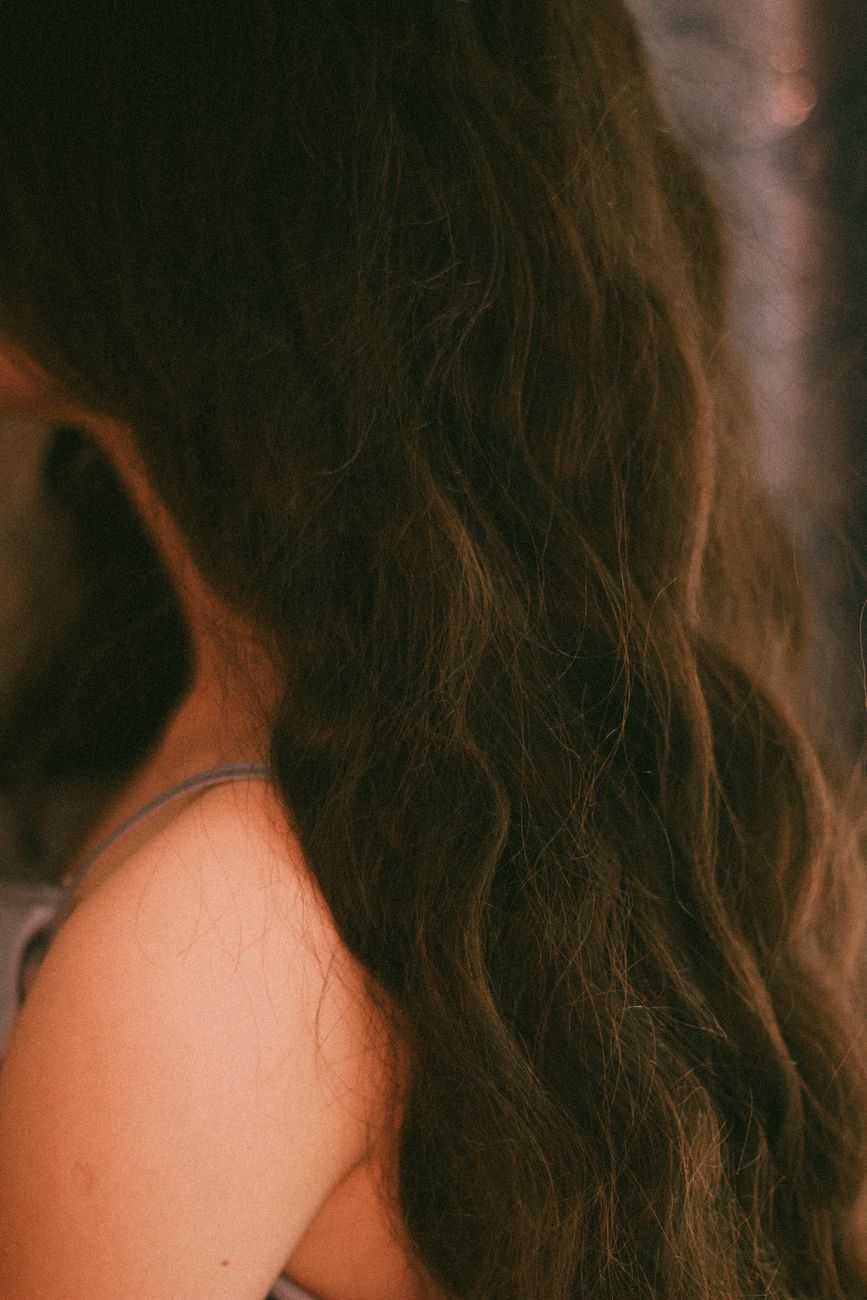 Partial vs. Full Balayage: Choosing the Right Option for Your Budget 1 close up photo of dark hair