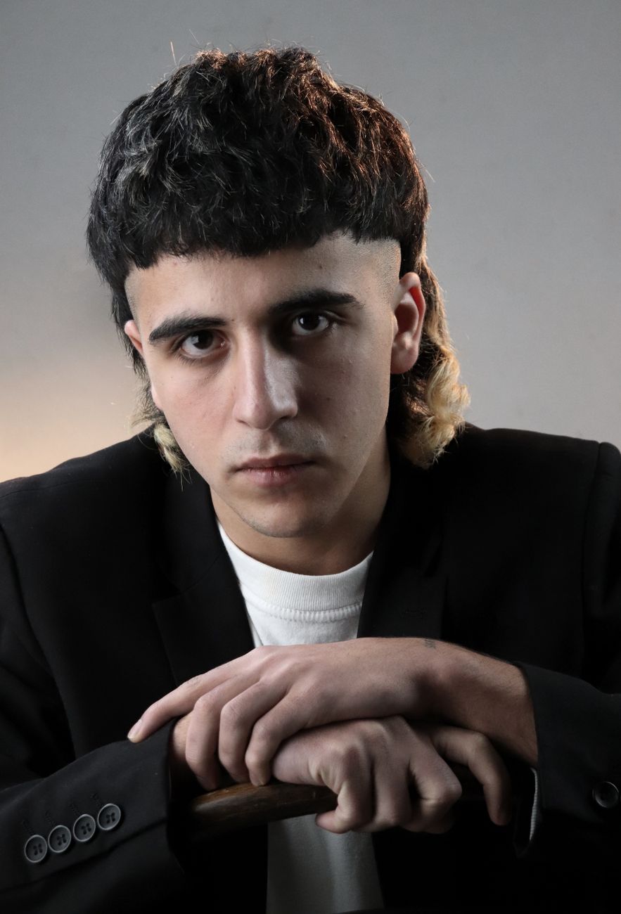 man in black suit jacket