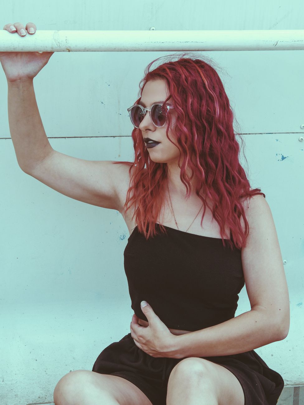 UV Armor for Hair: Guarding High-Fashion Shades from Sun Fade Conditions 1 redhead woman in sunglasses
