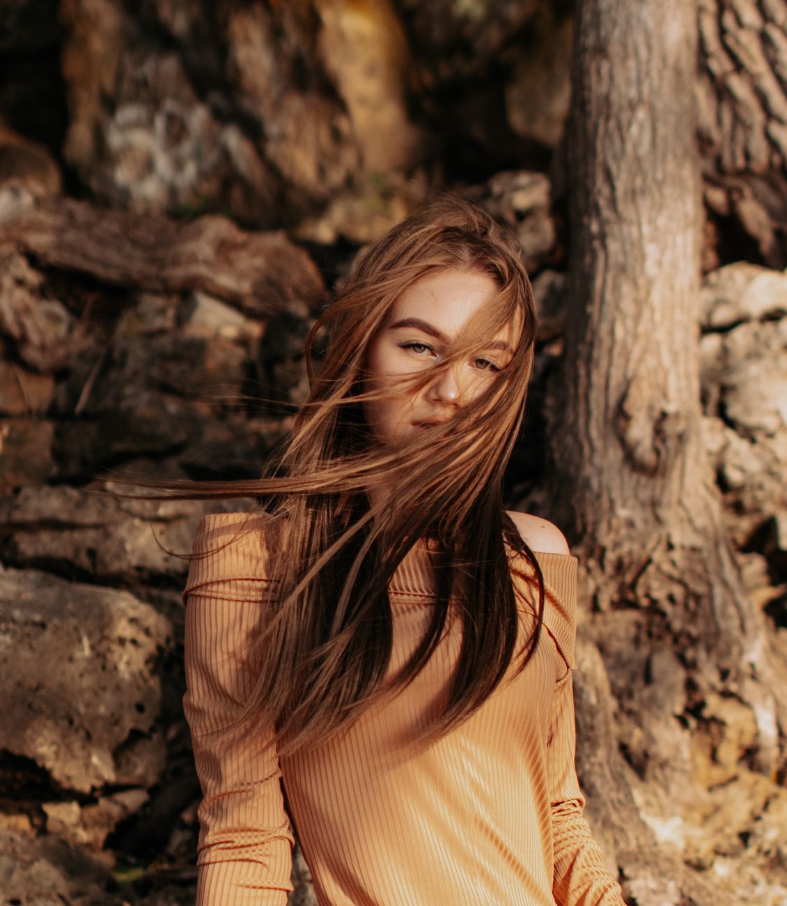 woman in brown long sleeve dress