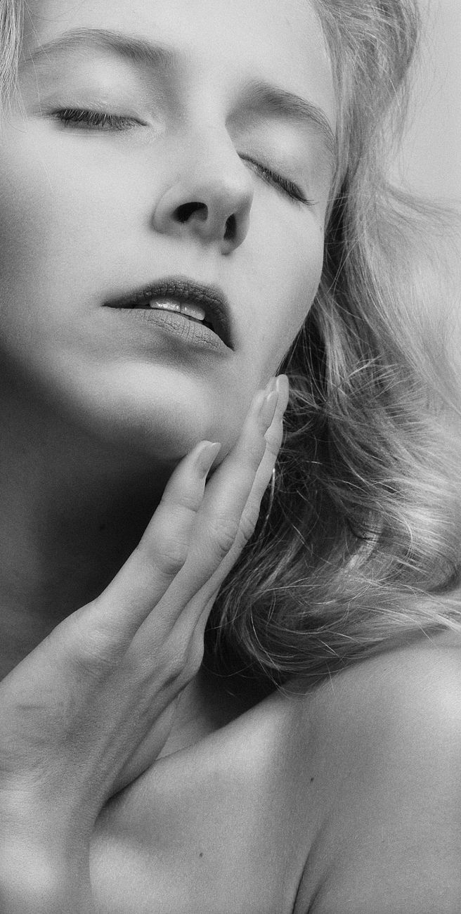 blonde model with eyes closed