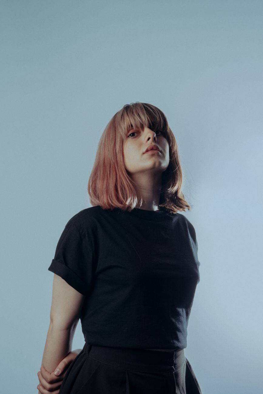 model posing in black tshirt