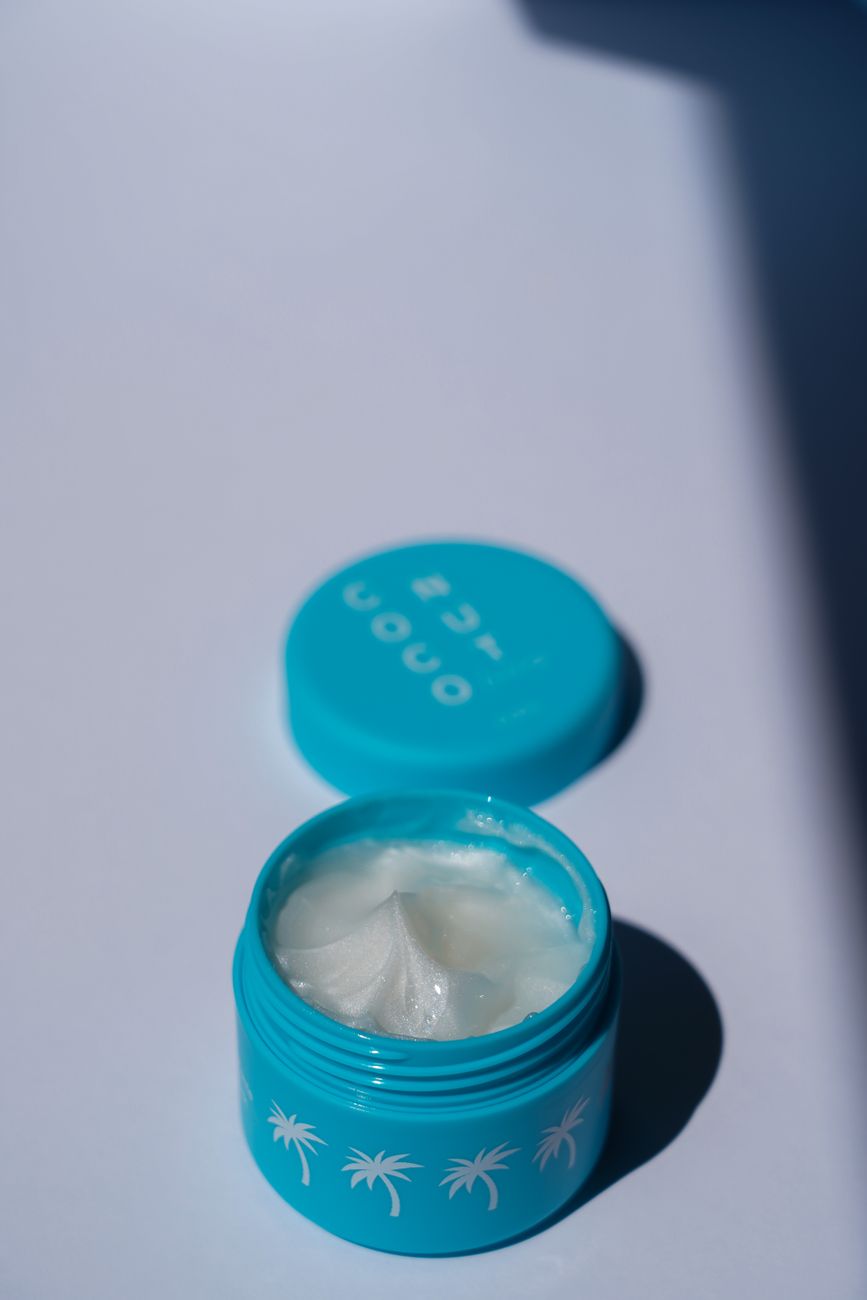 Moisture Sealing: How Smoothing Treatments Help Protect Hair from Humidity 1 a jar of coconut oil on a table