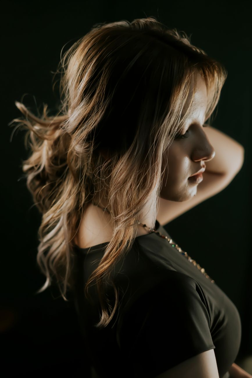 elegant side portrait of a young woman