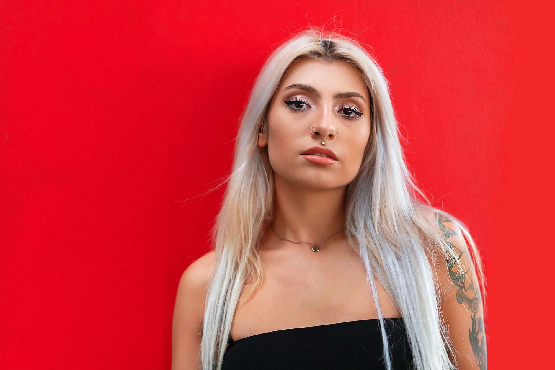 blond woman with nose ring