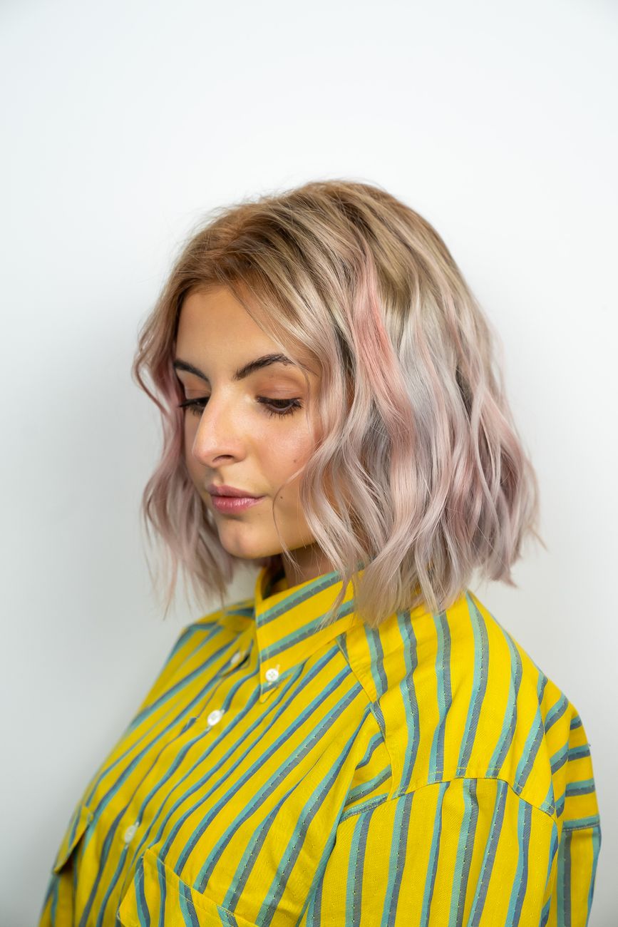 Soft Rose Gold Balayage: Subtle Pastel Perfection 1 woman in yellow and blue striped shirt