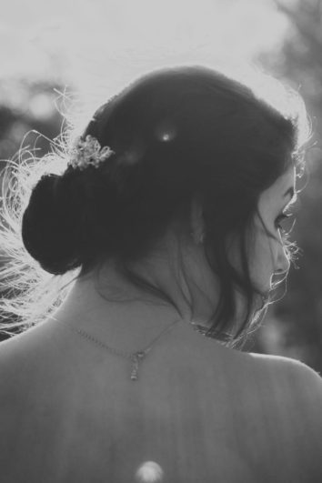 Classic Updos vs. Boho Waves: Choosing Your Wedding Style 1 a grayscale photo of a beautiful bride