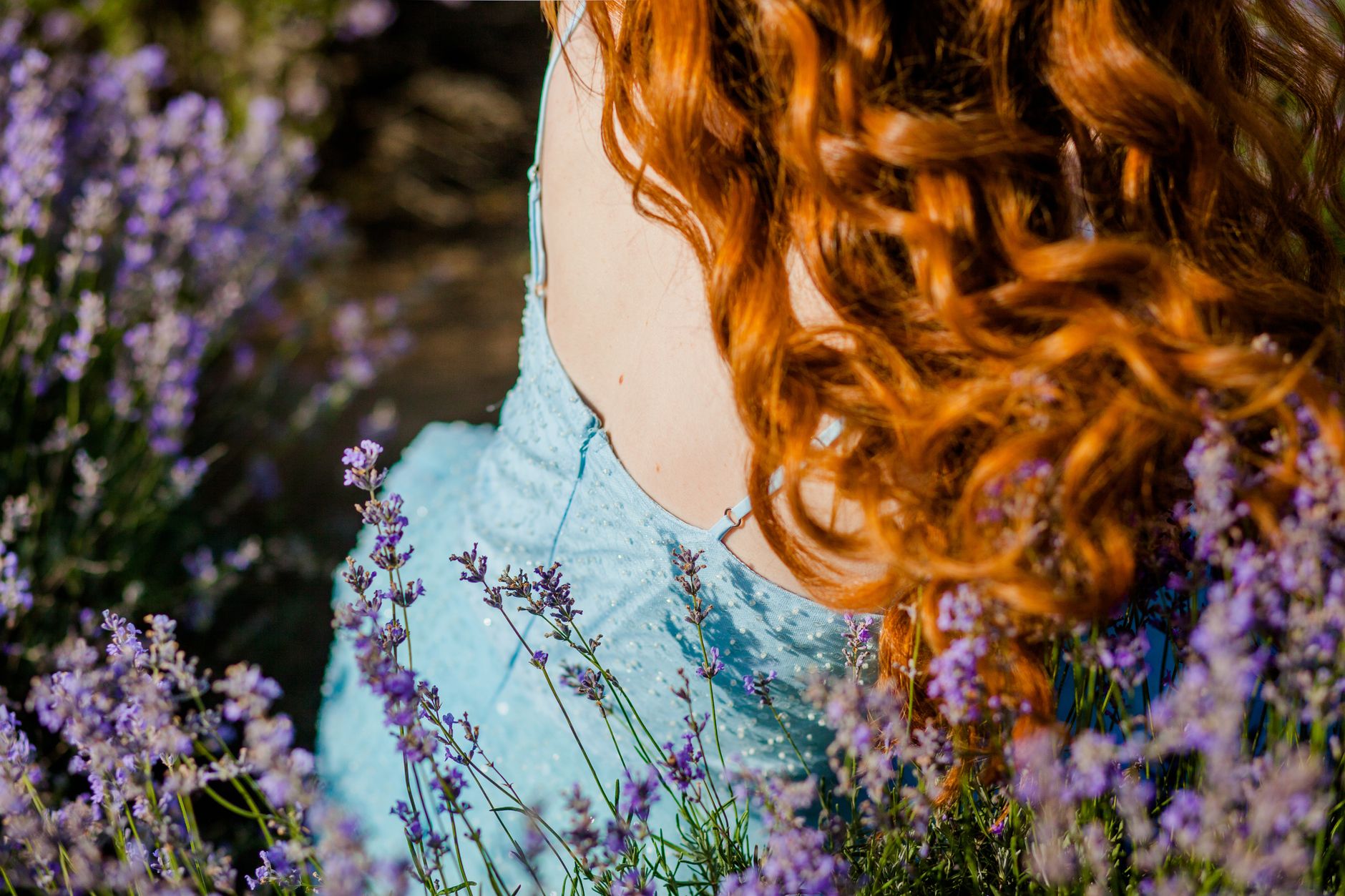 woman hair among flowers
