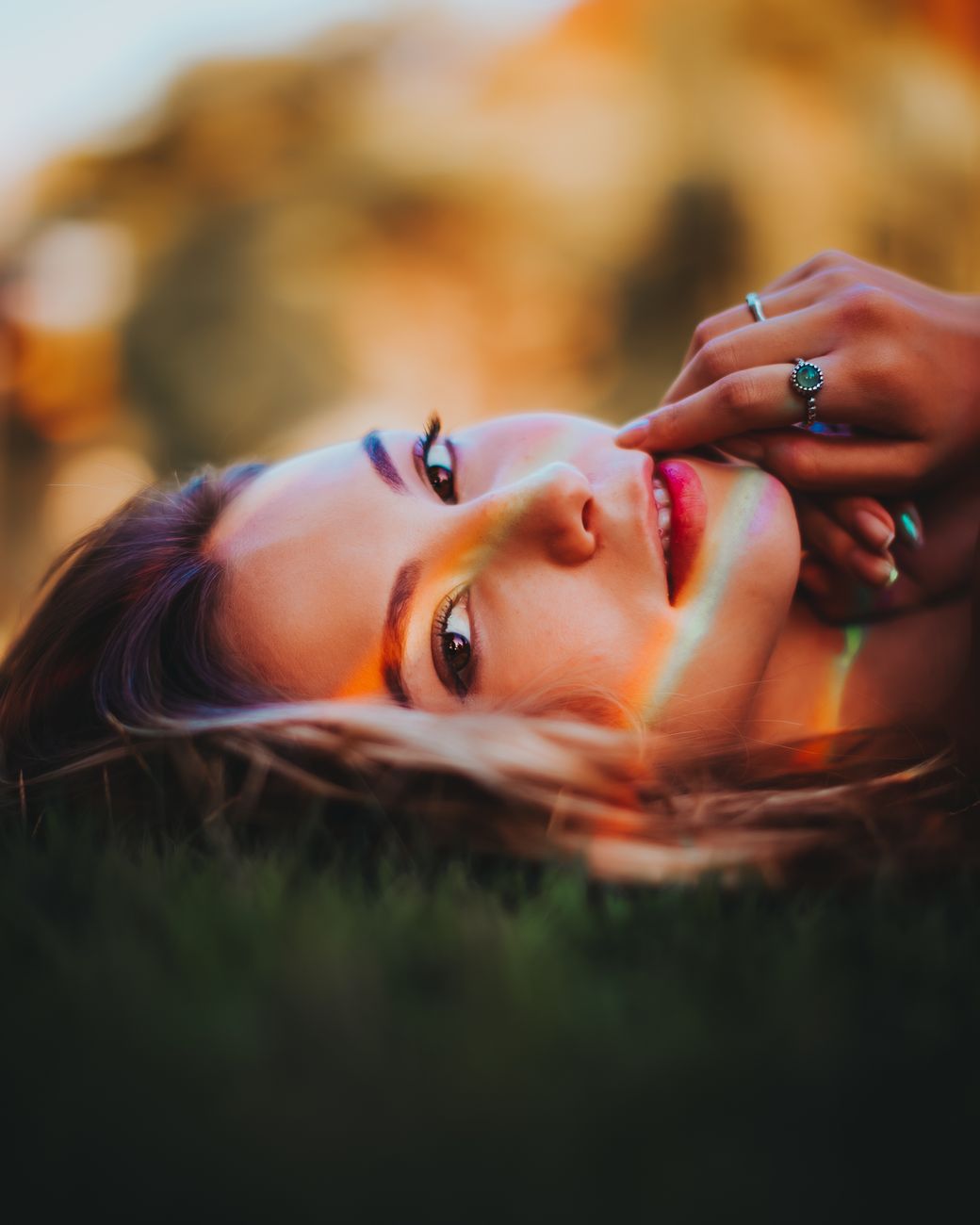woman lying in grass