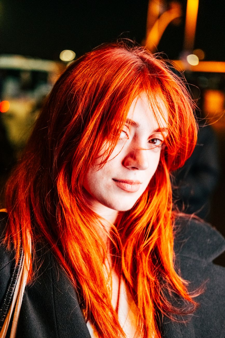 Vibrant Red Hair Care: Stopping Fading Before It Starts 1 smiling woman with dyed hair