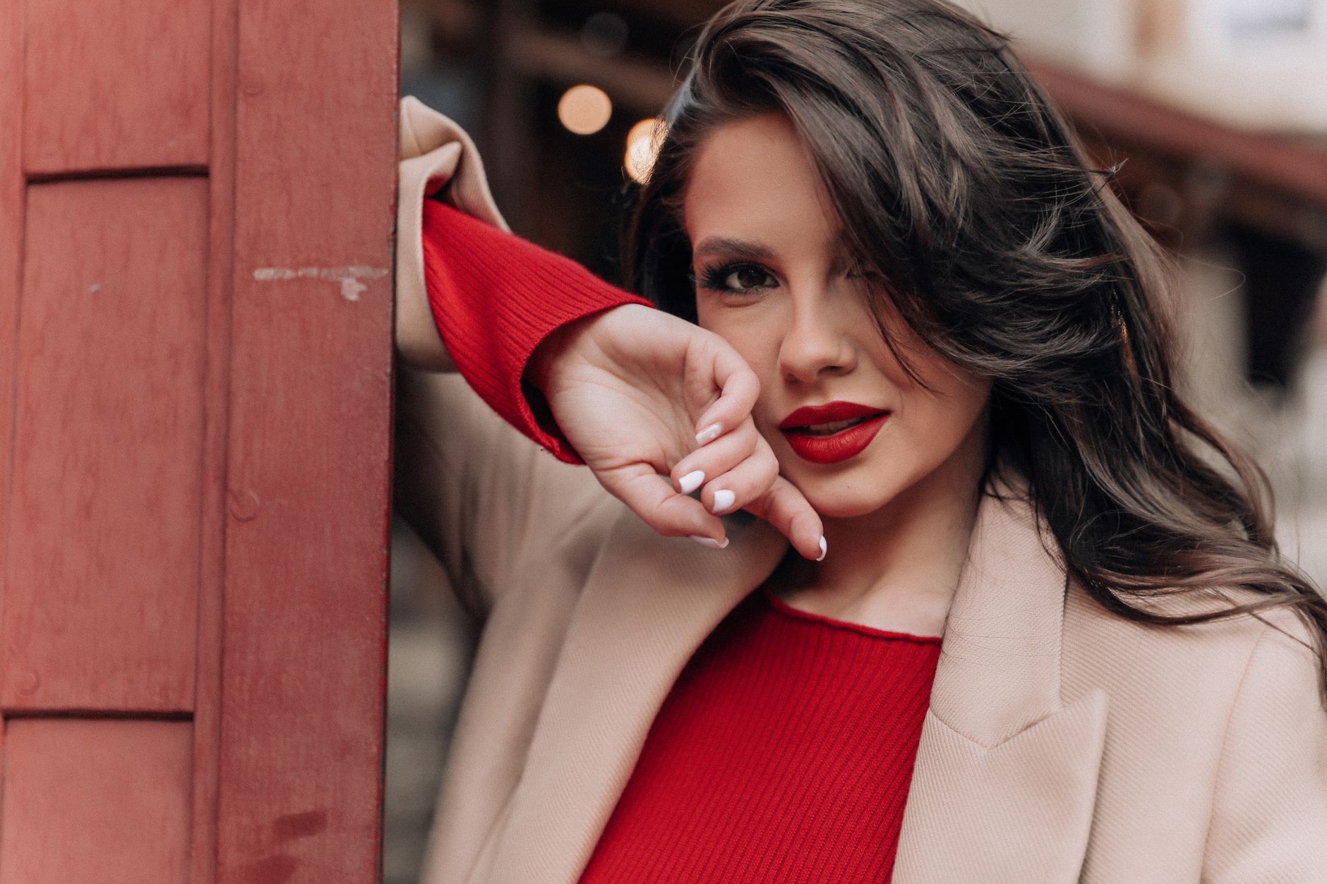 Curtain Bangs and Long Layer Styling Strategies 1 portrait of brunette woman in coat