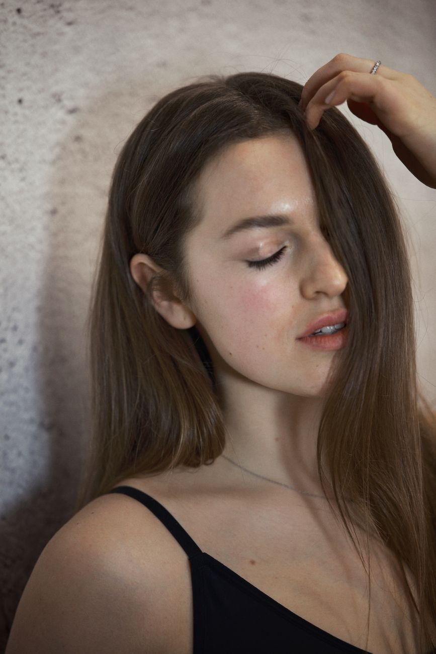 serene portrait of a woman with long hair