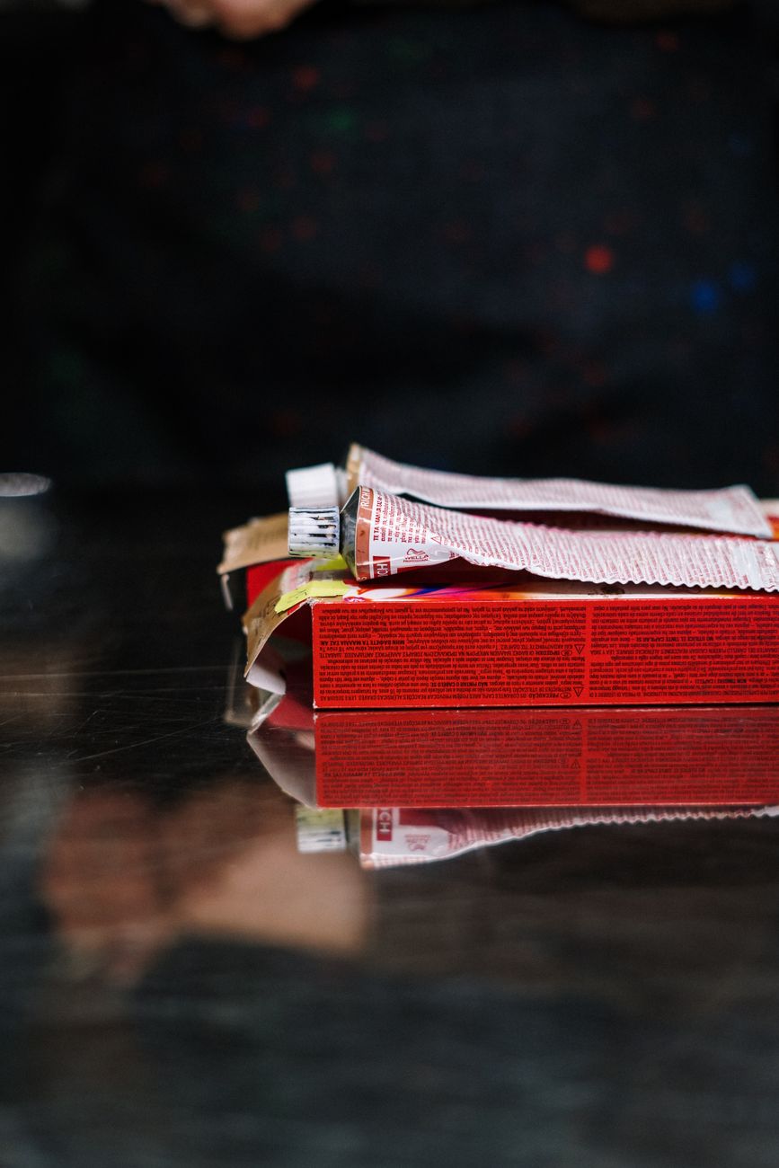 Color Correction 101: Fixing Box Dye Disasters Safely 1 red and white plastic pack