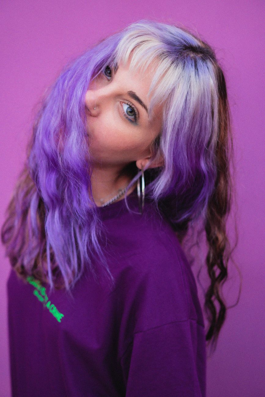 Two-Tone Color Panels: Modern Graphic Hair Styles 1 charming woman covering face with hair