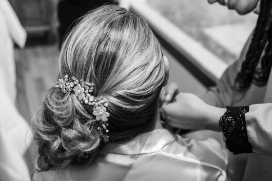 Messy Textured Updos: Effortless Elegance for Brides 1 black and white photo of a hairstyle