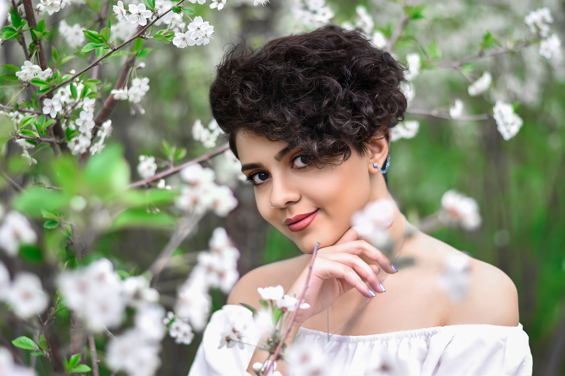 Tapered Short Cuts for Clean Profiles 1 a woman in white off shoulder top