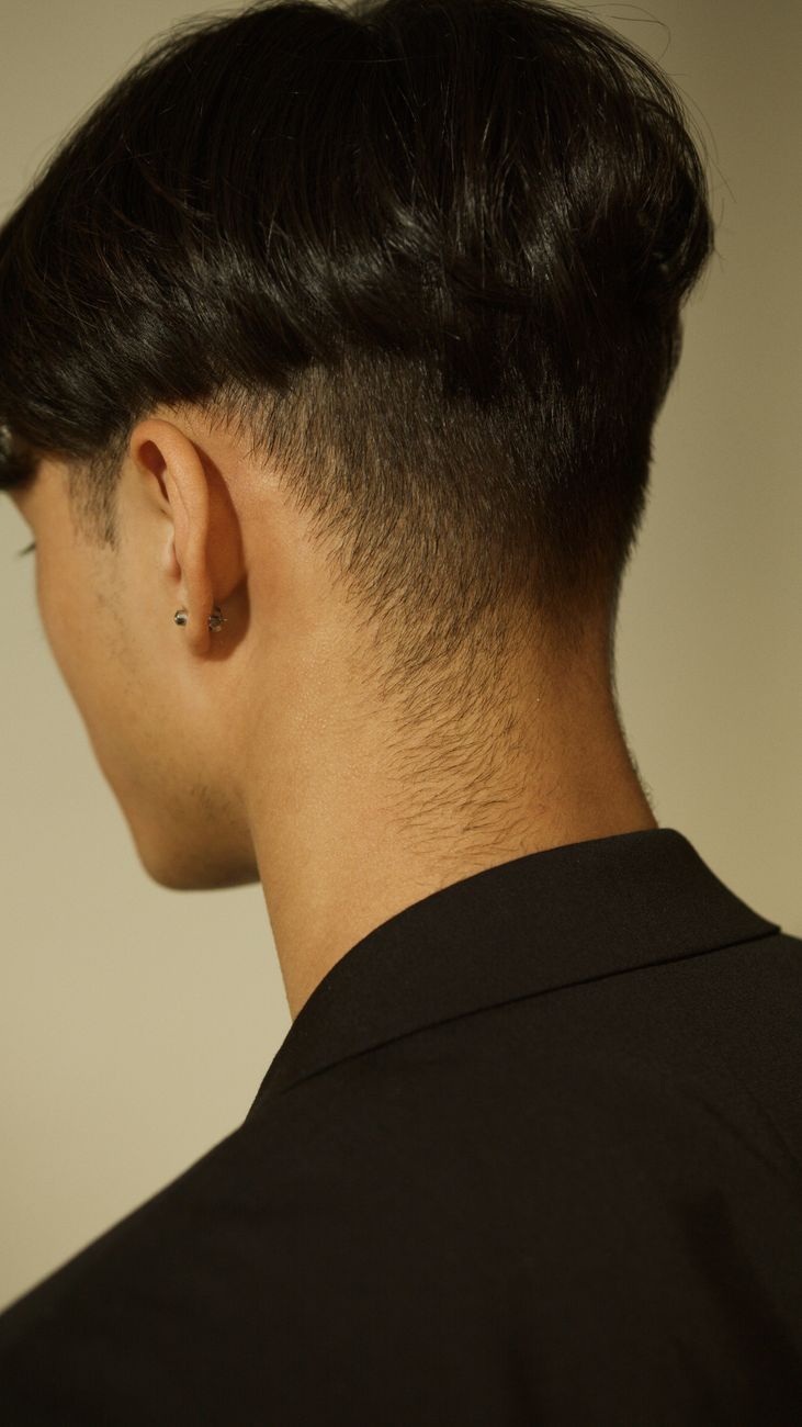 close up photo of nape of a man