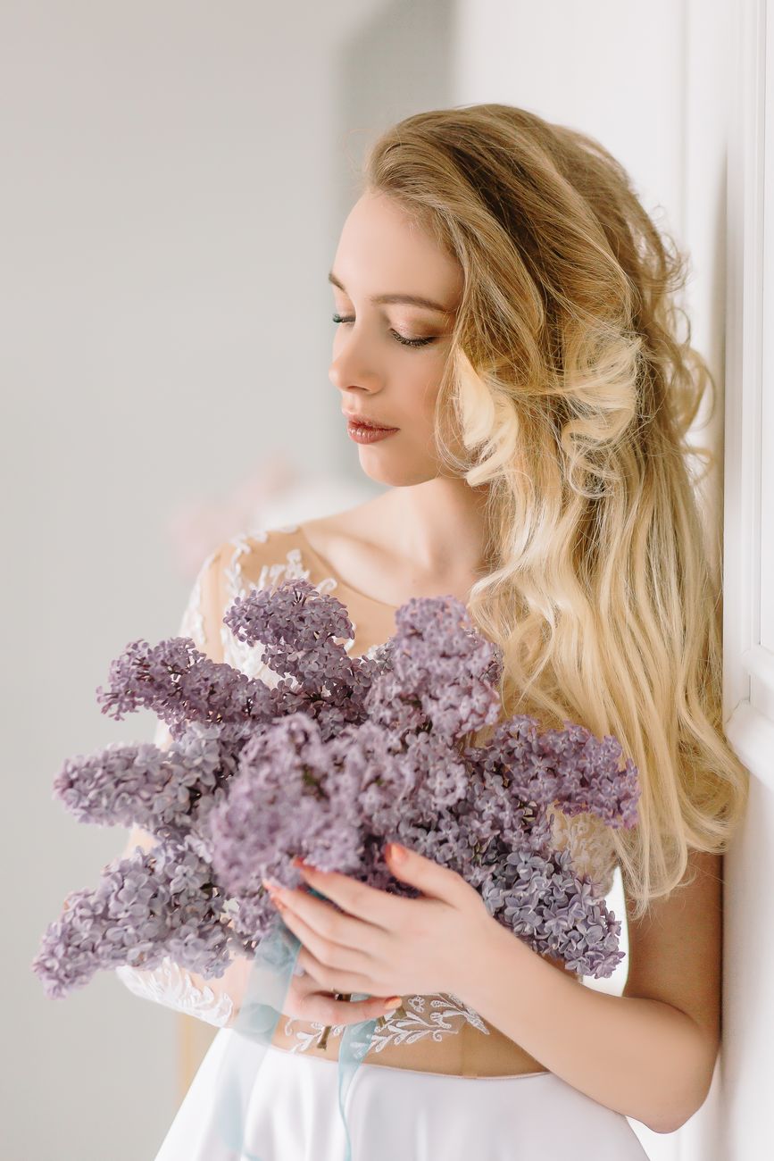 Lavender Fog: Soft Violet Tones for Lightened Bases 1 beautiful blonde woman holding flowers