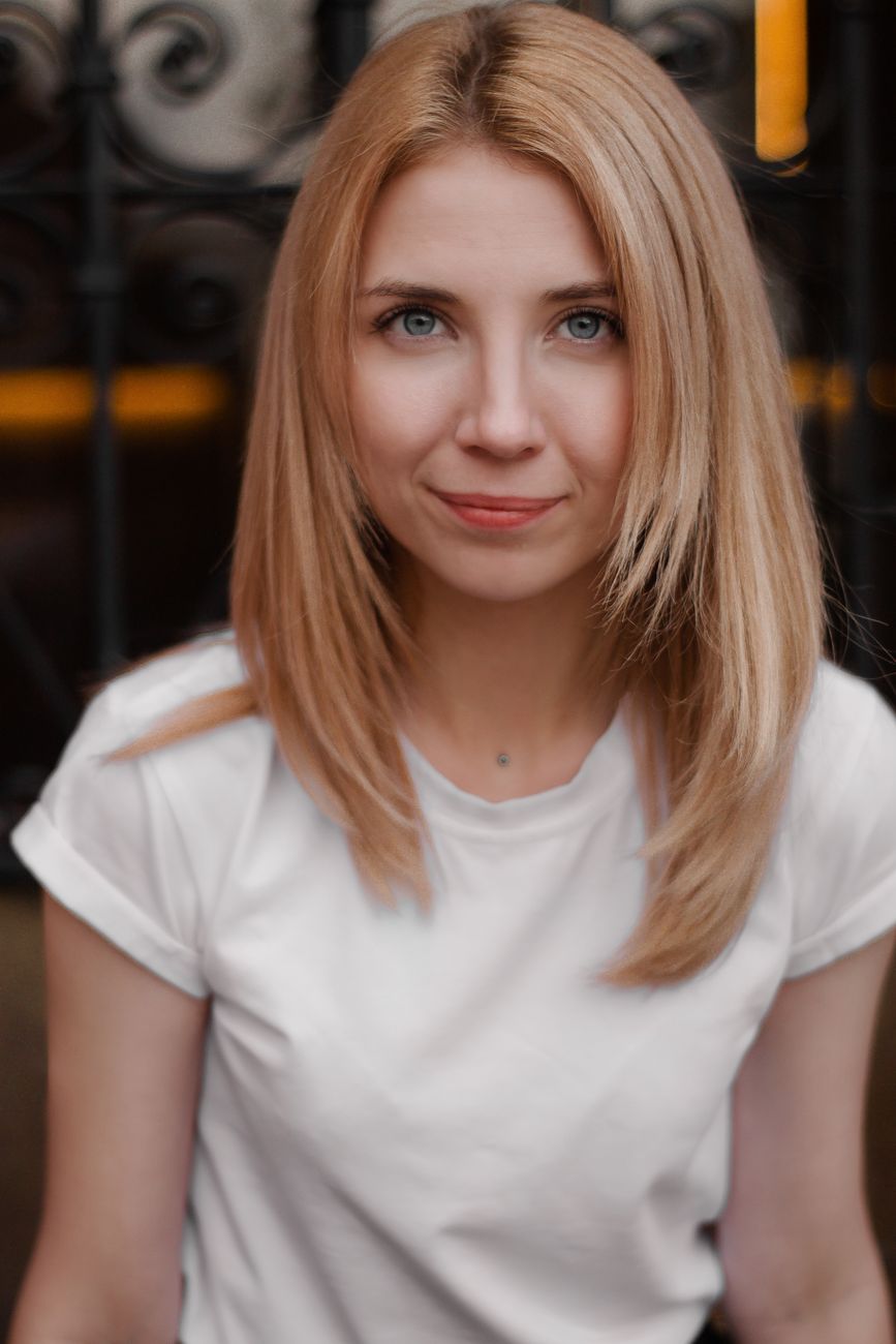 Face-Framing Tendrils: Adding Softness to Any Hair Length 1 alluring woman in white top