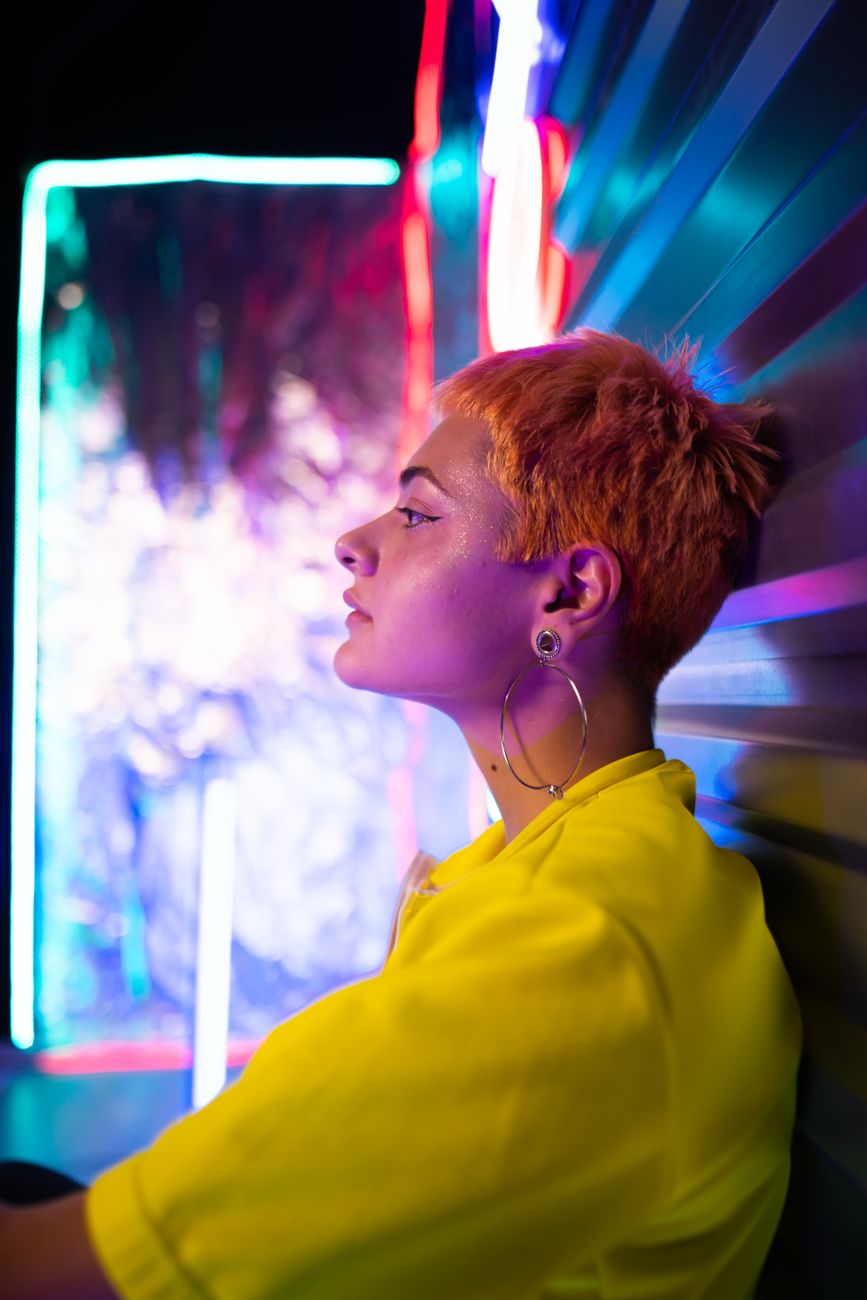 woman in yellow button shirt